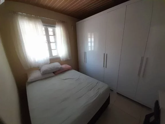 Imagem Casa com 2 dormitórios à venda, 49 m² por R$ 460.000 - Ocian - Praia Grande/SP