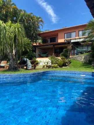 Imagem Casa Frente Mar Tanguá Angra dos Reis-RJ: 5 suítes + dependência, piscina, churrasqueira, píer e mais!