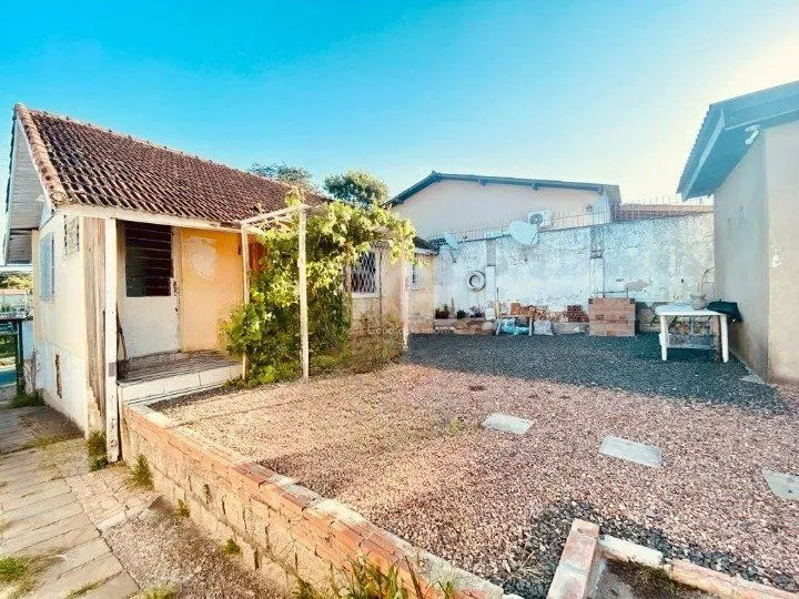 Imagem CASA BAIRRO CAMAQUÃ COM 4 DORMITORIOS