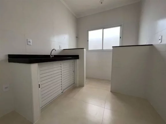 Imagem Casa com 2 dormitórios à venda, 51 m² por R$ 245.000 - Caiçara - Praia Grande/SP