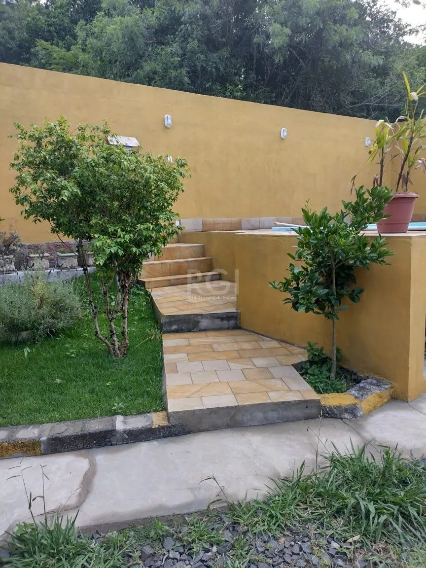 Imagem Casa para Venda - 0.18m², 2 dormitórios, sendo 2 suites, 3 vagas - Lomba do Pinheiro