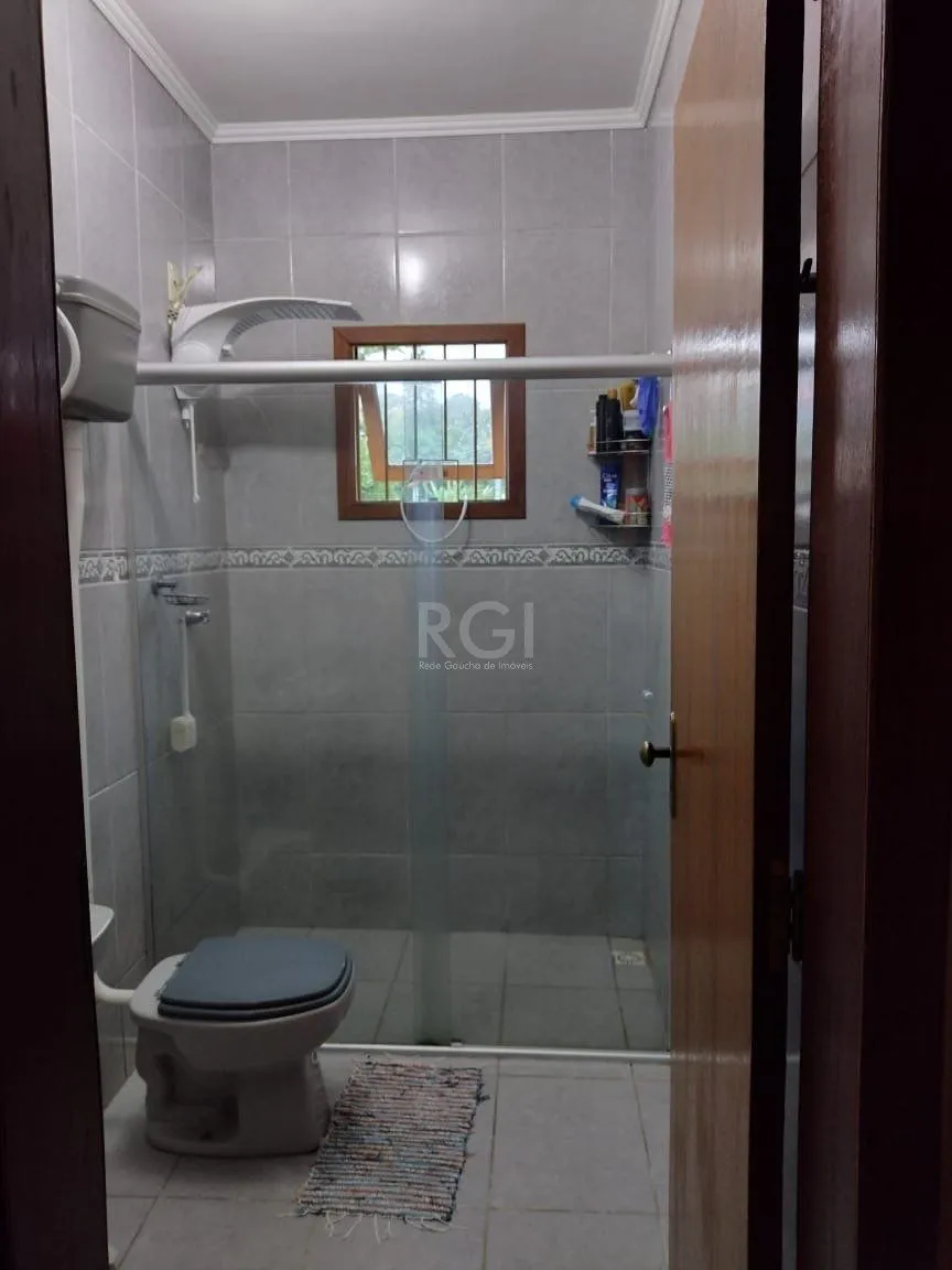 Imagem Casa para Venda - 0.18m², 2 dormitórios, sendo 2 suites, 3 vagas - Lomba do Pinheiro