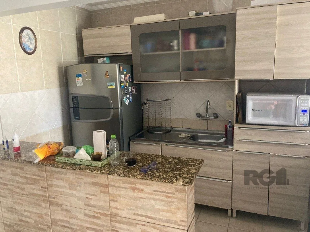 Imagem CASA | 2 DORMITÓRIOS | 1 SUÍTE | 2 VAGAS | PISCINA | SACADA | BAIRRO HÍPICA | ZONA SUL