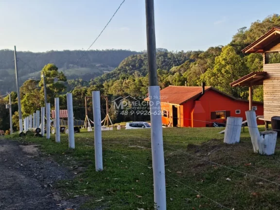 Imagem Propriedade rural de sítio e alto padrão com negócio de locação de cabanas. São 13 hectares escritura pública 05 cabanas 01 sede