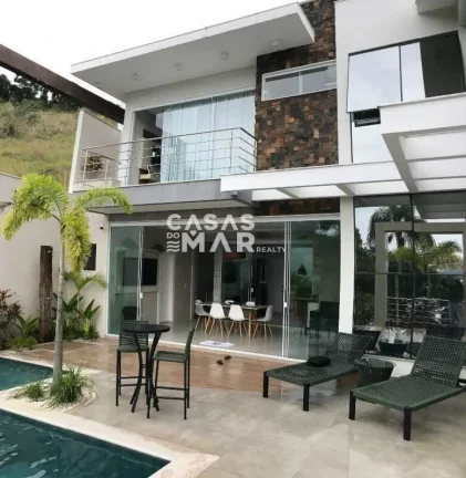 Imagem Casa frente mar de luxo em Angra dos Reis-RJ, bairro Piraquara (cunhambebe), 4 quartos, 4 suítes, 6 banheiros, 400m². Venha conferir!