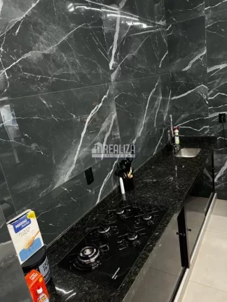 Imagem Casa à venda no Jardim Espanha, Uberaba | 2 dormitórios, suíte, piscina e varanda gourmet