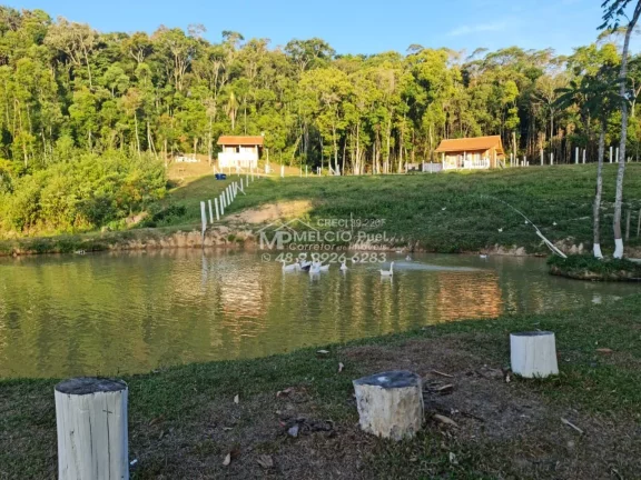 Imagem Propriedade rural de sítio e alto padrão com negócio de locação de cabanas. São 13 hectares escritura pública 05 cabanas 01 sede