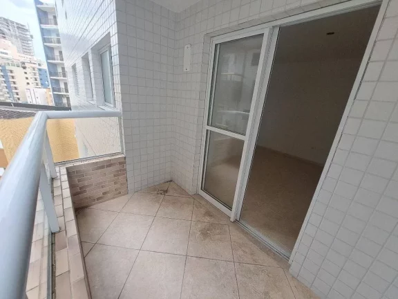 Imagem Apartamento com 2 dormitórios à venda, 56 m² por R$ 320.000 - Caiçara - Praia Grande/SP