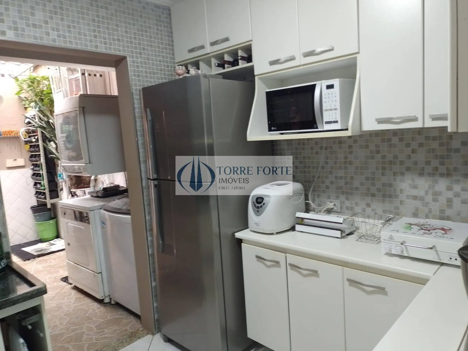 Imagem linda casa 3 dormitórios, com 2 vagas em ótima localização