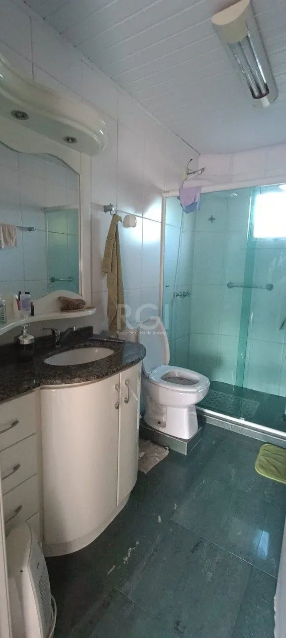 Imagem Casa para Venda - 250m², 3 dormitórios, sendo 1 suites, 2 vagas - Vila Nova, Porto Alegre