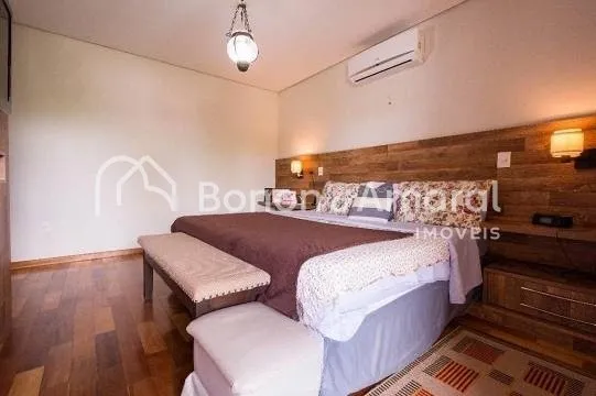 Imagem Casa de condomínio com 340 m² e 4 quartos