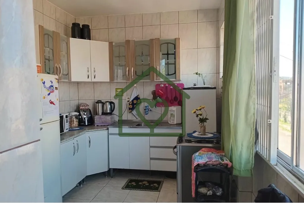 Imagem Descubra o seu novo lar no coração de Porto Alegre, no bairro Camaquã! Este encantador apartament...