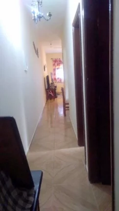 Imagem CASA GEMINADA MUITO BEM CONSERVADA EM OTIMO LOCAL