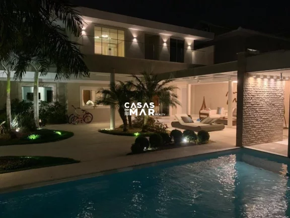 Imagem Imponente mansão de luxo na Barra da Tijúca: 5 quartos, 4 suítes, 3 salas, 7 banheiros, 2 vagas de garagem, 920m² de área. Venda!