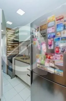 Imagem Apartamento com 57m², dois dormitórios sendo uma suíte, living, cozinha tipo americana, área de ...