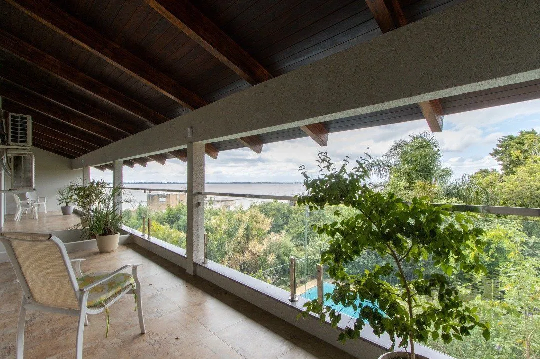 Imagem Sobrado com vista para Rio, 3 quartos, 2 suites, pátio, piscina, vaga para 4 carros - Bairro Vila Assunção