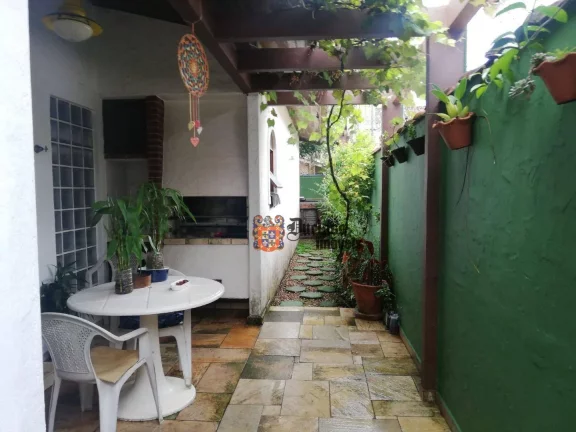 Imagem Casa com 4 dormitórios à venda, 160 m² por R$ 1.000.000 - Balneário Praia do Pernambuco - Guarujá/SP