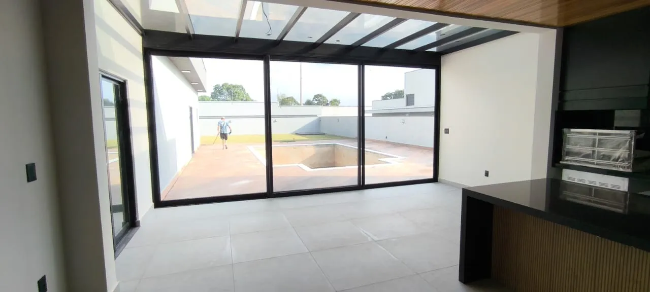 Imagem Casa de Condomínio com 3 Suítes e 5 banheiros à Venda, 528 m² por R$ 5.800.000
