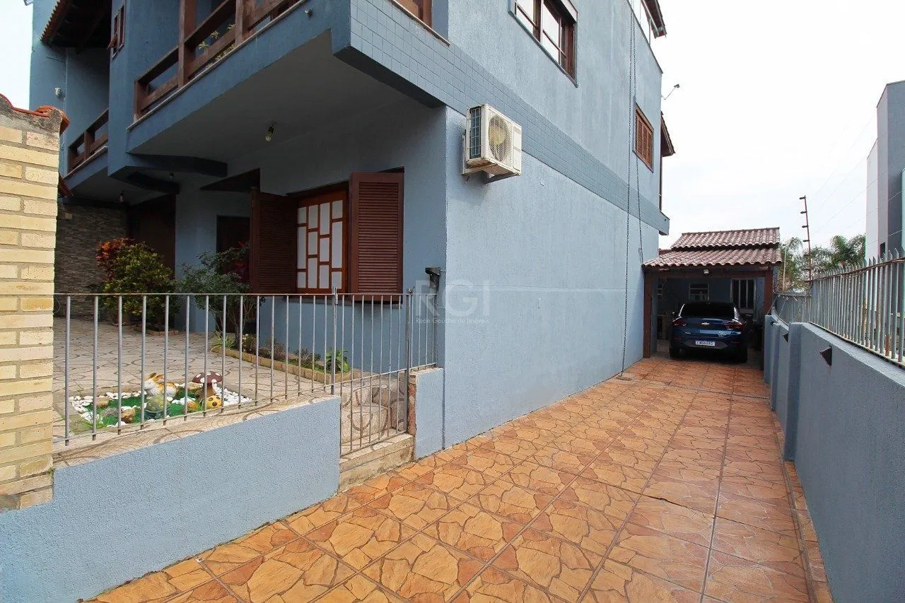 Imagem Casa para Venda - 339m², 3 dormitórios, 2 vagas - Vila Nova, Porto Alegre