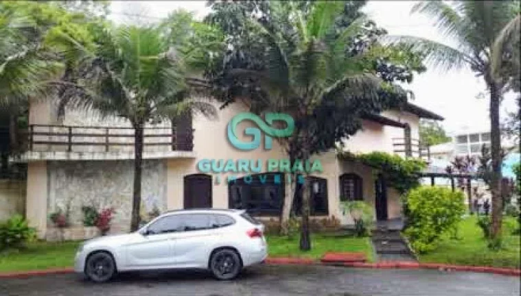 Imagem Casa com 6 quartos sendo 4 suítes, sala de jantar, sala de estar, sala de TV, 5 banheiros, cozinha armário planejado, lavanderia, churrasqueira, piscina, lindo jardim arborizado