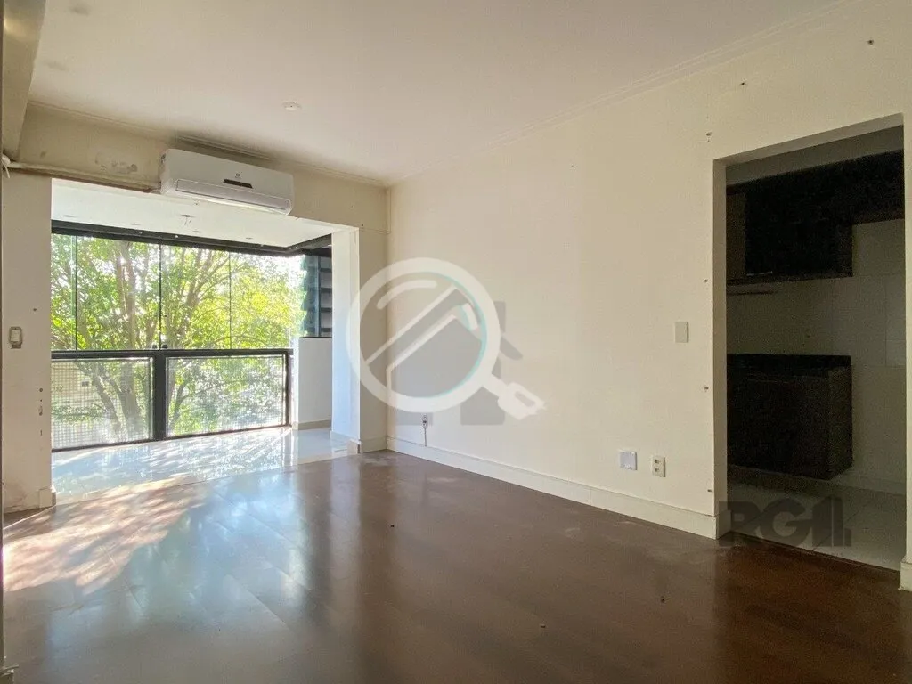 Imagem Apartamento de 75m², 2 dormitórios, living amplo em L com sacada integrada, churrasqueira na sacad...