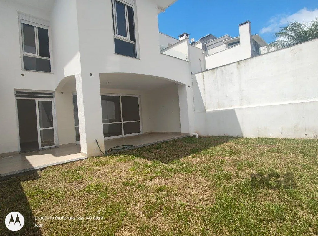 Imagem Casa em Condomínio fechado com 3 dormitórios no bairro Vila Nova em Porto Alegre, RS