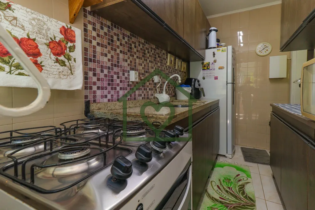 Imagem Apartamento no bairro Camaquã com 61m2 privativos, localizado a um lance de escada, composto por do...