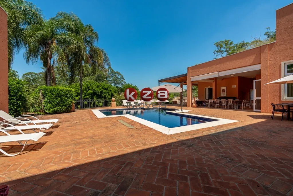 Imagem Luxuosa mansão de alto padrão a venda no Condomínio Terras de São José em Itu- SP, com 5 suítes, amplo gourmet com piscina e 1.500m² de área.
