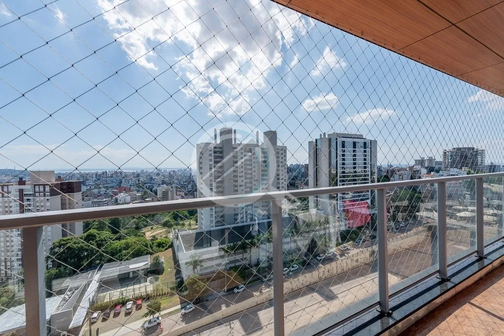 Imagem Ótimo apartamento em andar alto com linda vista perene do Rio Guaíba. Imóvel com 76,69 m2 de áre...