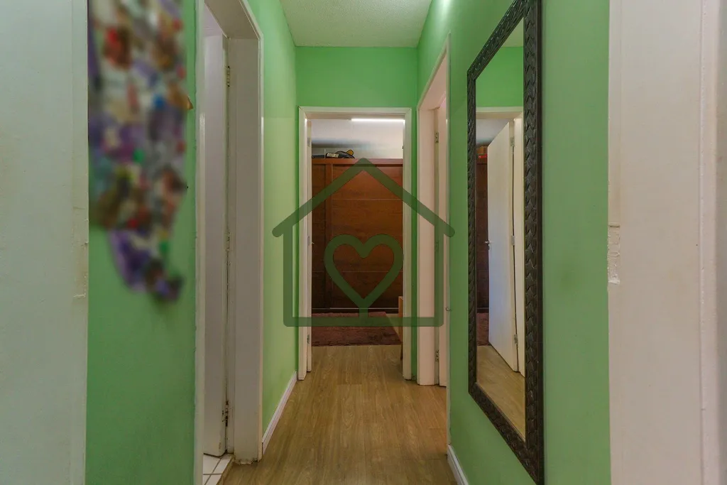 Imagem Apartamento no bairro Camaquã com 61m2 privativos, localizado a um lance de escada, composto por do...