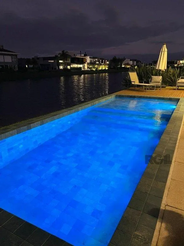 Imagem Casa de Condomínio em Atlântida Sul