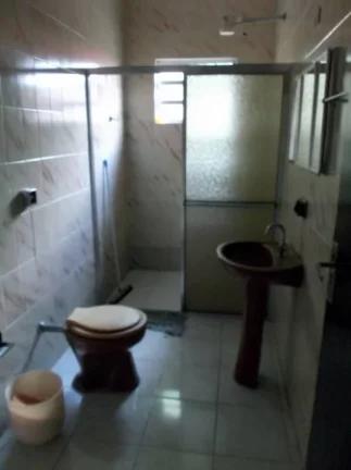 Imagem casa lado praia- tres dormitorios