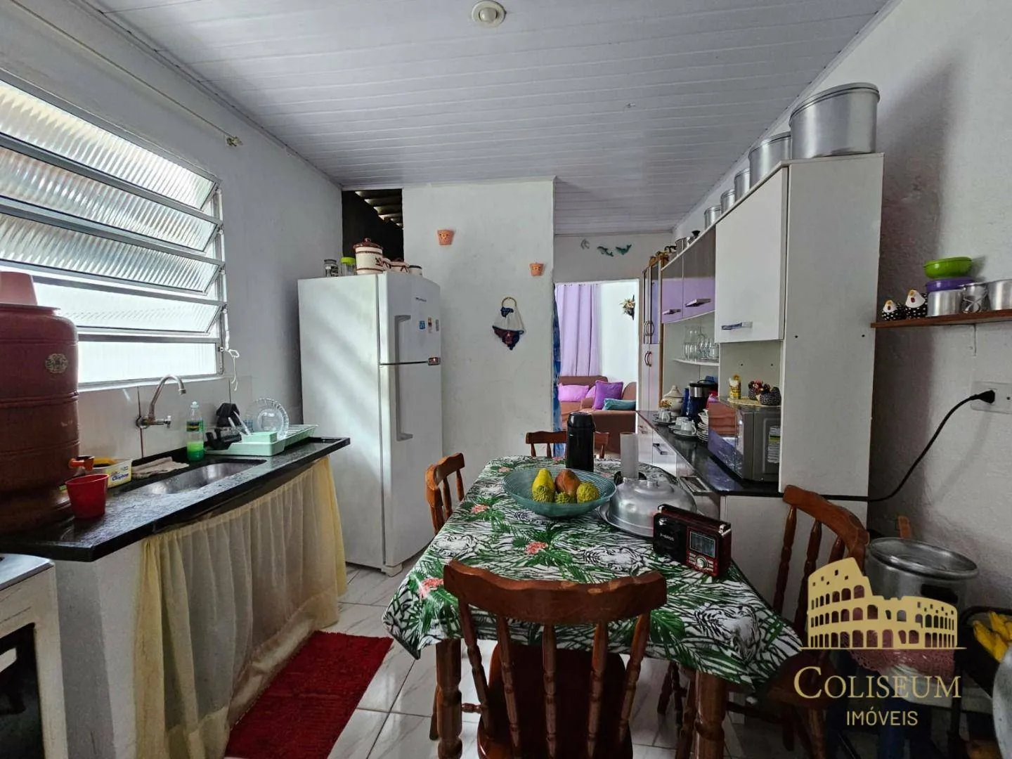 Imagem Casa com 2 dormitórios à venda, 93 m² por R$ 330.000,00 - Vila Antártica - Praia Grande/SP