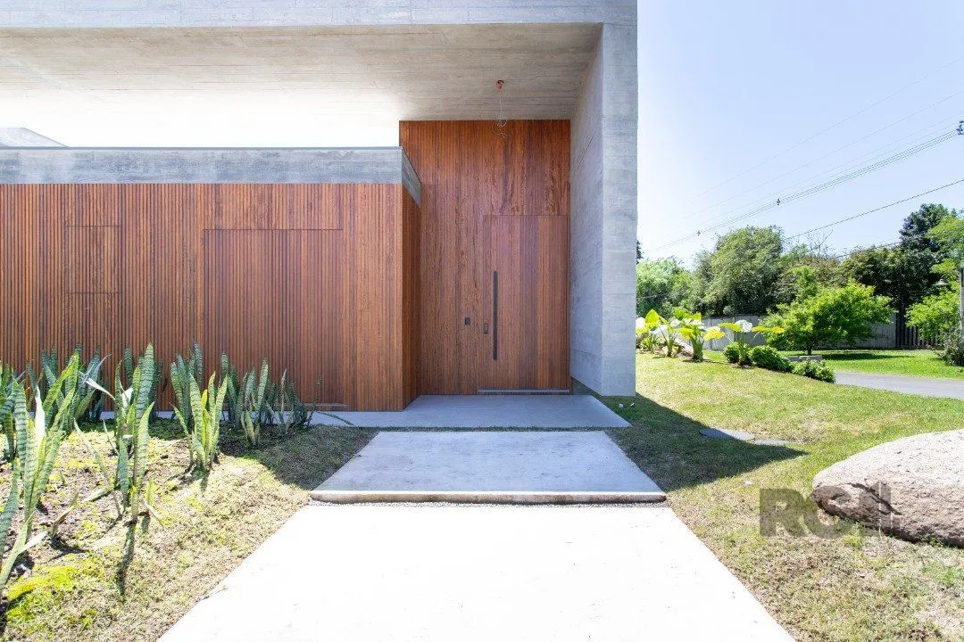 Imagem A Casa Le Mans, uma residência térrea de esquina com 389,48m2 de área coberta