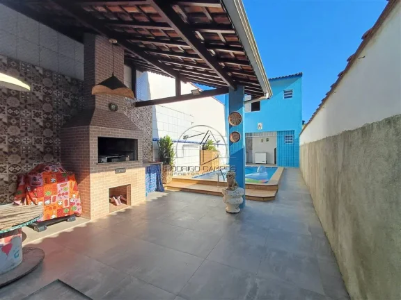 Imagem Espaçosa Casa Geminada no Mirim Praia Grande – 2 Quartos e Piscina