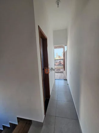 Imagem Sobrado com 3 dormitórios à venda, 100 m² por R$ 570.000,00 - Maracanã - Praia Grande/SP