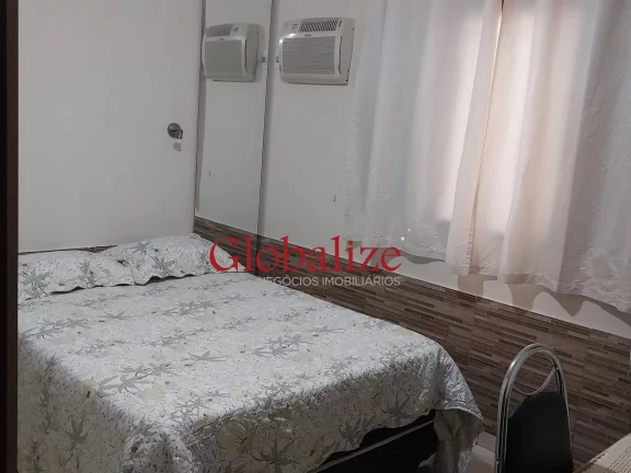 Imagem Casa térrea à venda com 125m², 2 quartos, churrasqueira, área coberta, vaga de garagem coberta por R$390.000,00 em Santos