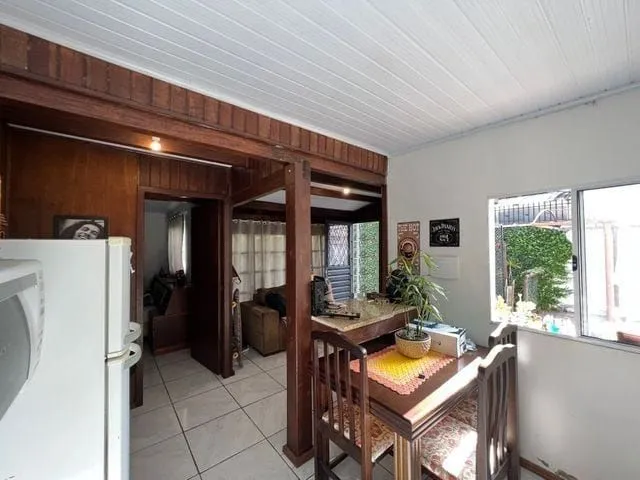 Imagem Terreno medindo 11 X 39,66 com 2 casas de alvenaria