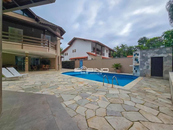 Imagem Belíssima casa à venda, com 5 Dormitórios 3 Suítes 310m2 de área útil - Riviera de São Lourenço - Bertioga S/P