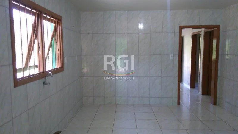 Imagem Casa para Venda - 100m², 3 dormitórios, 2 vagas - Centro
