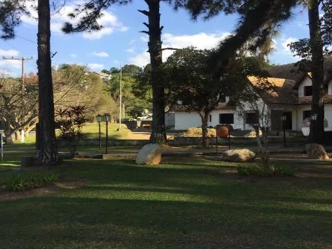 Imagem VENDA CASA EM ESTILO NORMANDO CONDOMÍNIO ARUJÁ HILLS I II com A/T 1838,23m², A/C 817,42m² e Pavimento térreo 408,71m². CONSULTE-NOS.