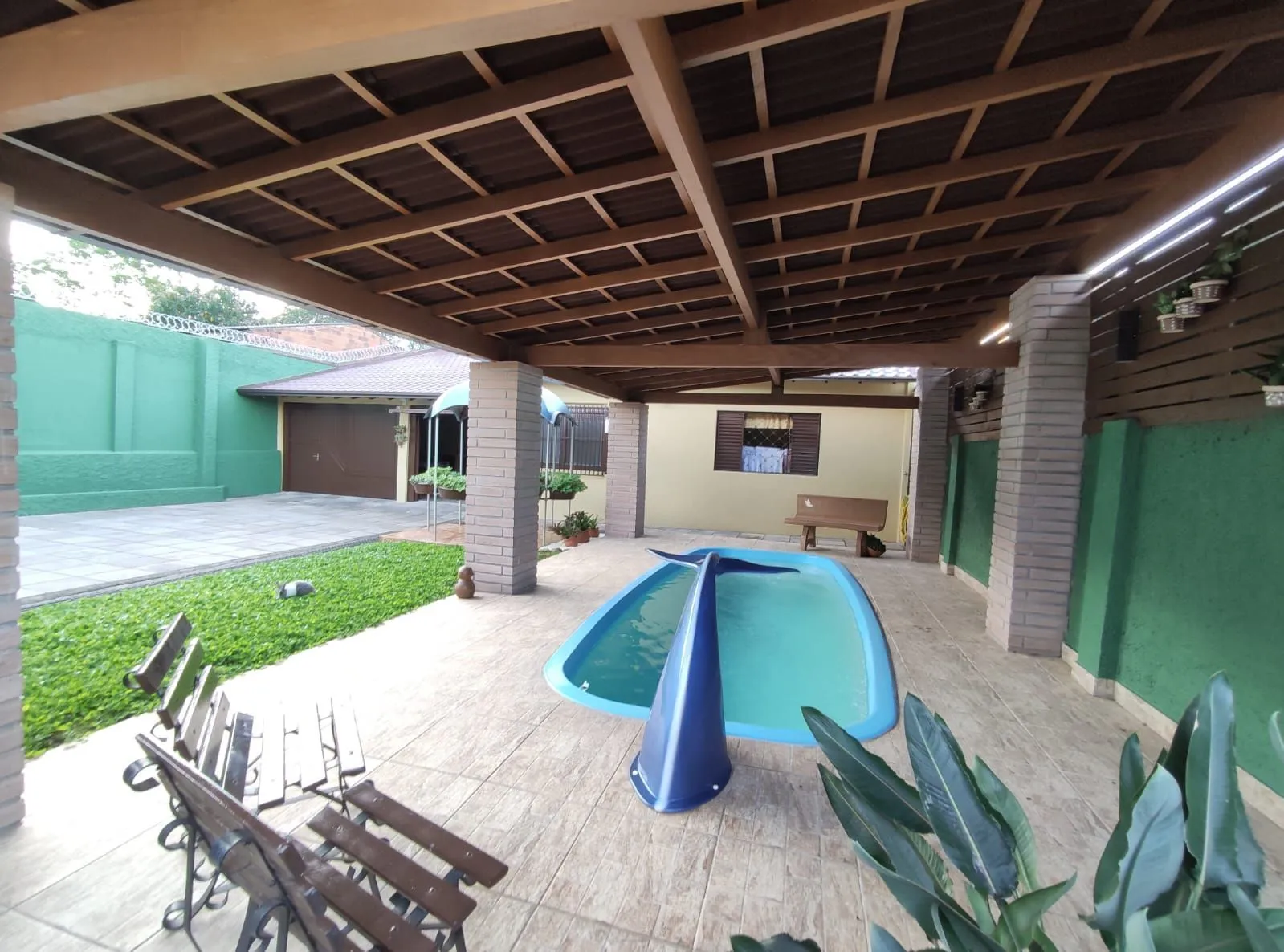 Imagem Casa Plana 3 quartos (1 suíte) churrasqueira e piscina coberta, Novo Hamburgo.
