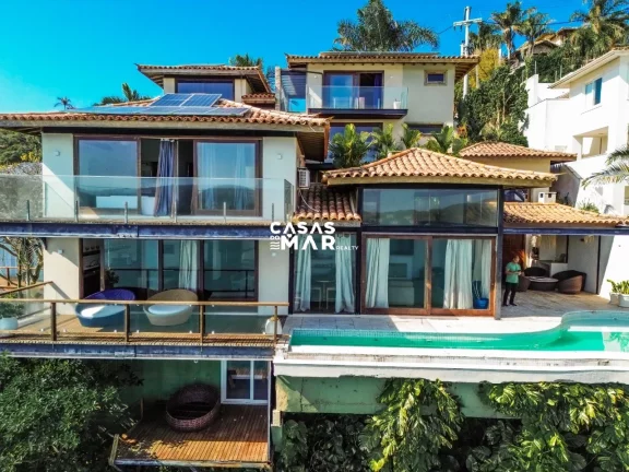 Imagem Casa Frente Mar de Luxo em Búzios-RJ: 5 Suítes, 3 Salas, 8 Banheiros, 3 Vagas, 400m².