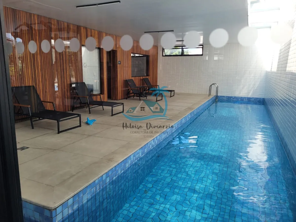Imagem Casa nova com 2 suítes a venda em condomínio fechado a 500 metros da orla do Itaguá em Ubatuba