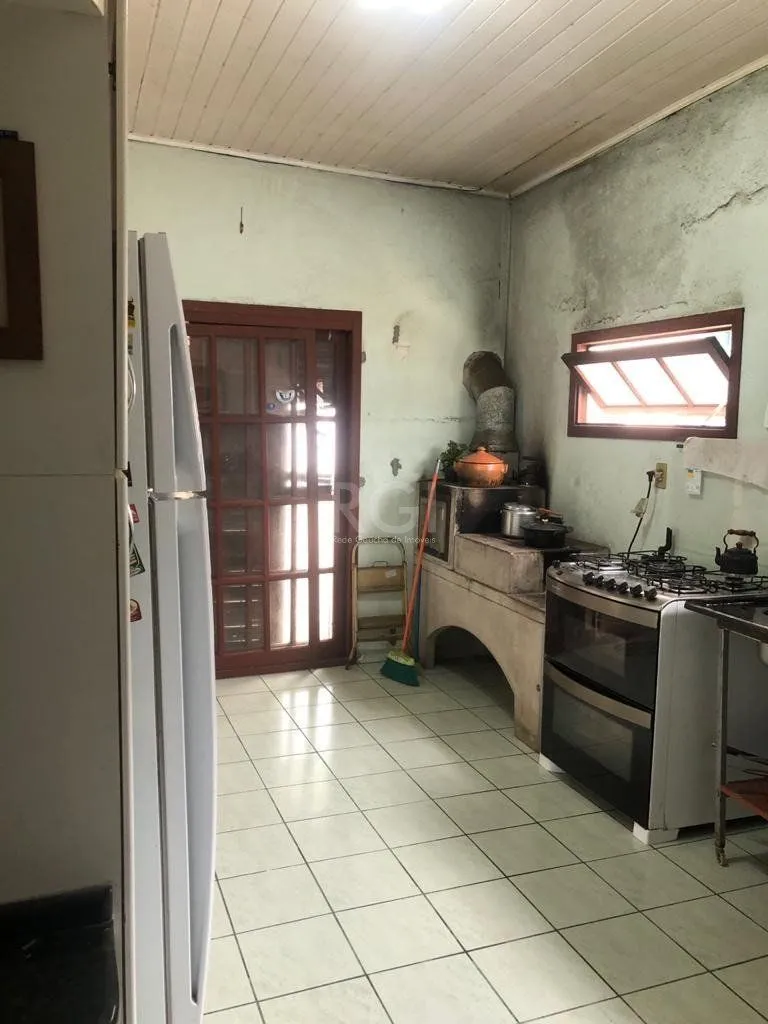 Imagem Casa/terreno medindo 200m² de privativo, 550m² totais no bairro Partenon, 9 vag