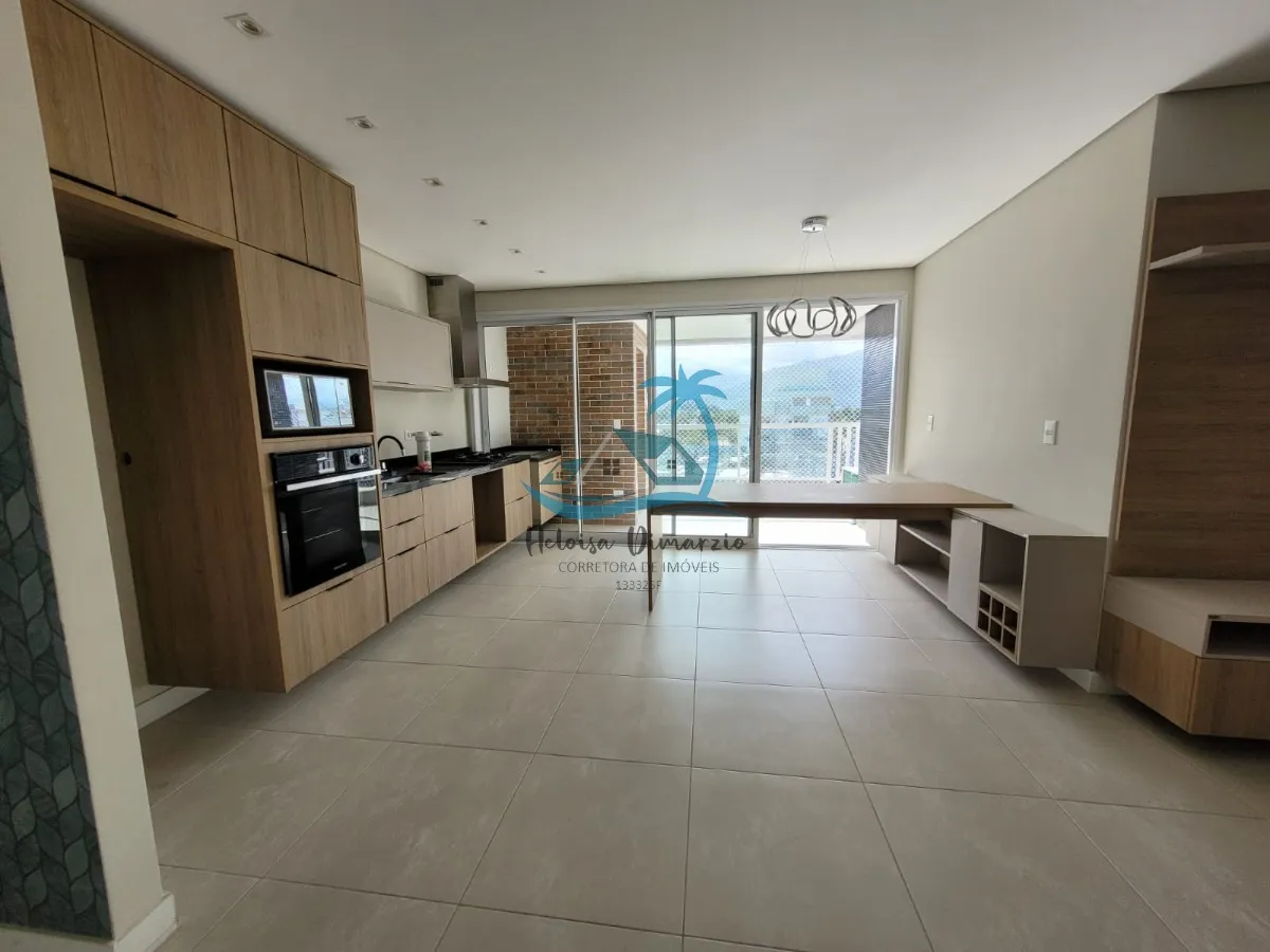 Imagem Excelente Apartamento com 3 dormitórios semi mobiliado e vista para o mar, a venda a 250 metros da orla de Itagua em Ubatuba.