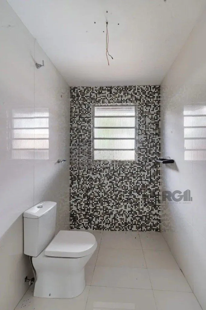 Imagem Casa com 3 dormitórios no bairro Passo das Pedras