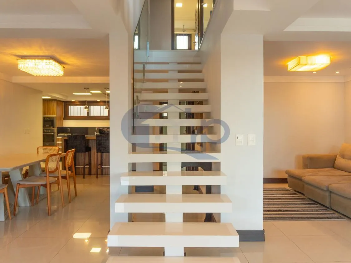 Imagem Casa de Alto Padrao com 4 Dormitorios, Piscina Aquecida e Espaço Gourmet no Centenario, em Torres/RS