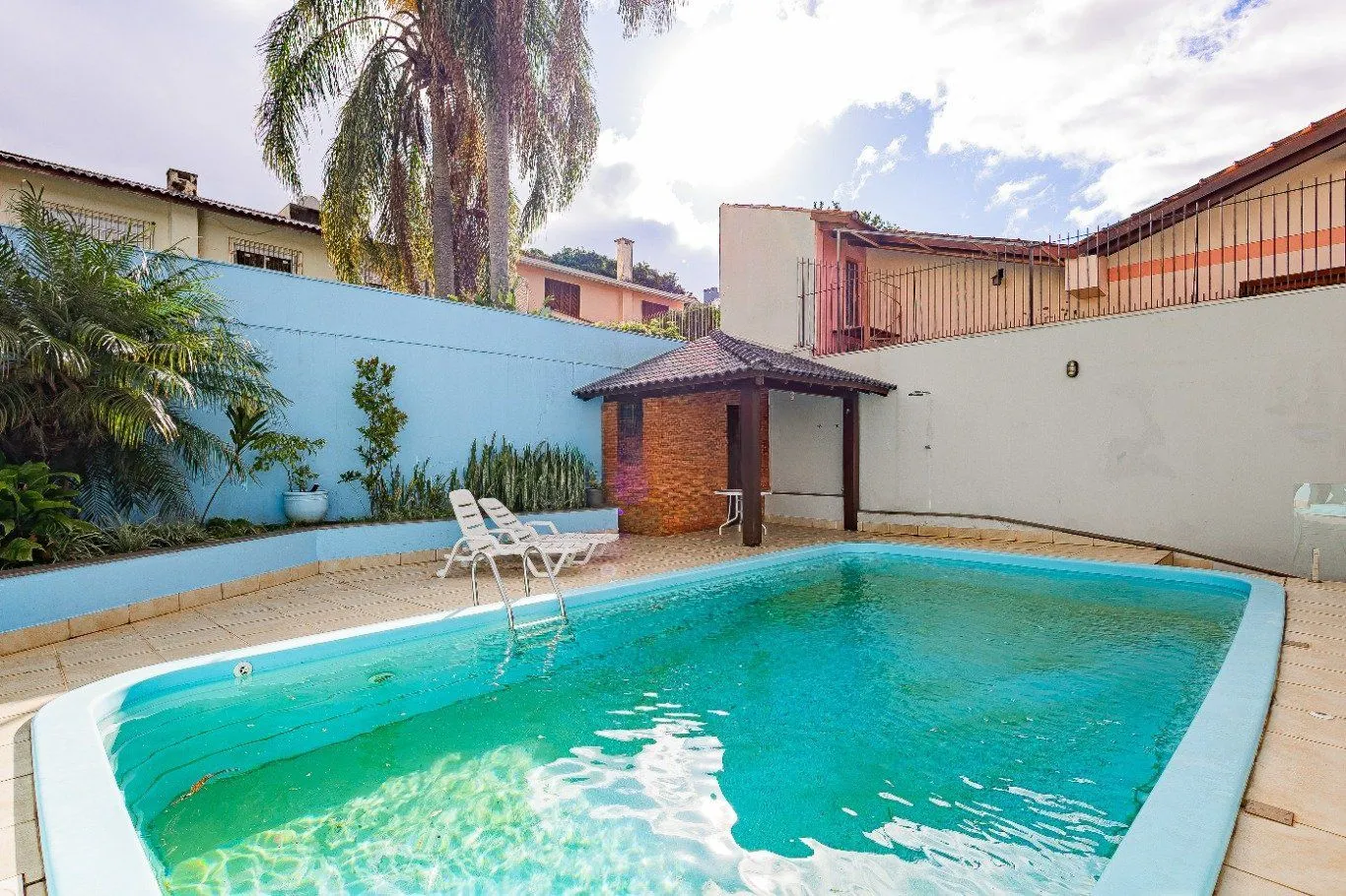 Imagem Casa de 4 dormitórios e 208m² à venda no Bairro Jardim Botânico, Porto Alegre.