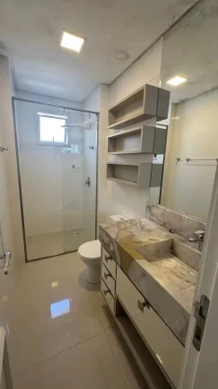 Imagem Apartamento frente mar mobiliado com 4 suítes e 3 vagas de garagem em Itapema